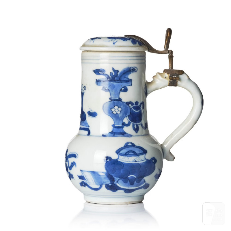 A blue and white jug with cover,